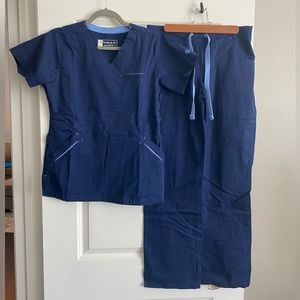 Women’s navy blue scrubs set (top and pants).